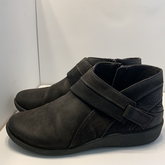 Clarks ankle bootie with zipper on one side and Velcro strap on the other. - Picture 3 of 6